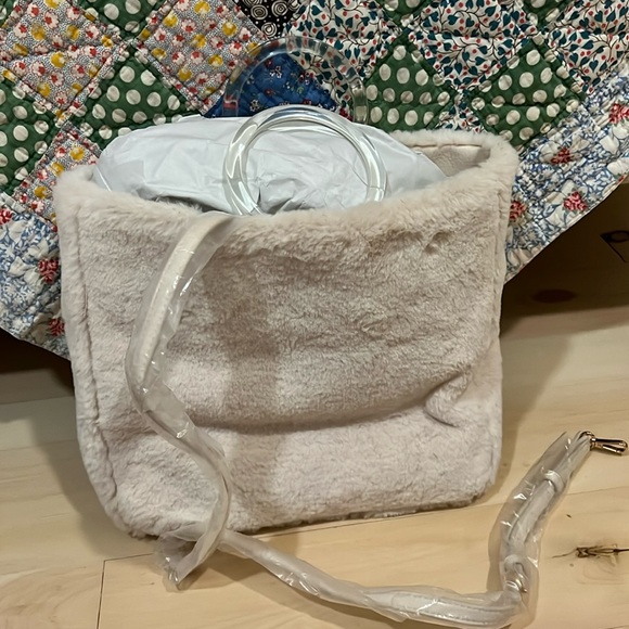 LC Lauren Conrad Handbags - Lauren Conrad fur purse with strap NWT